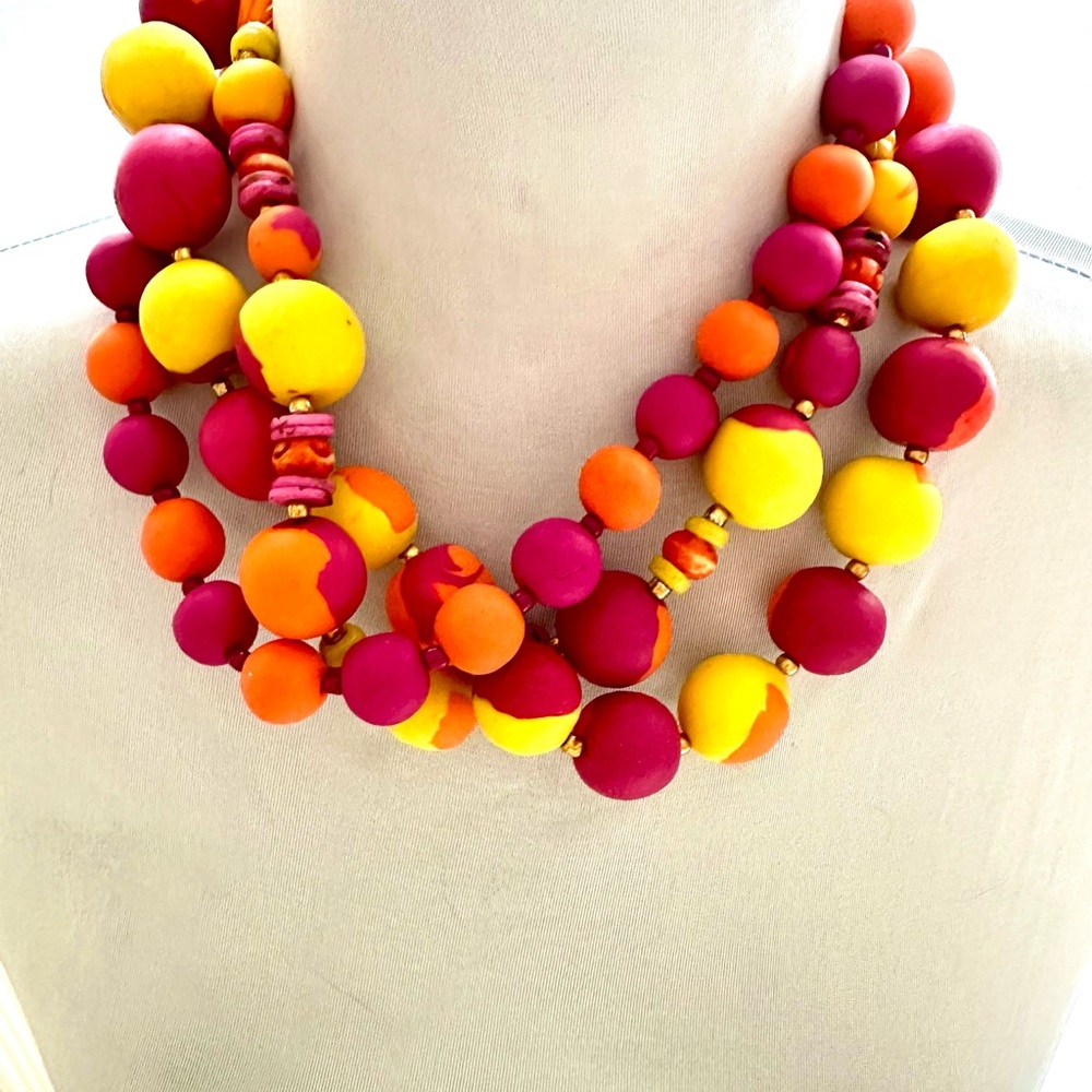 Artisan-made multi-strand necklace with hand-rolled, hand-sculpted artist clay.